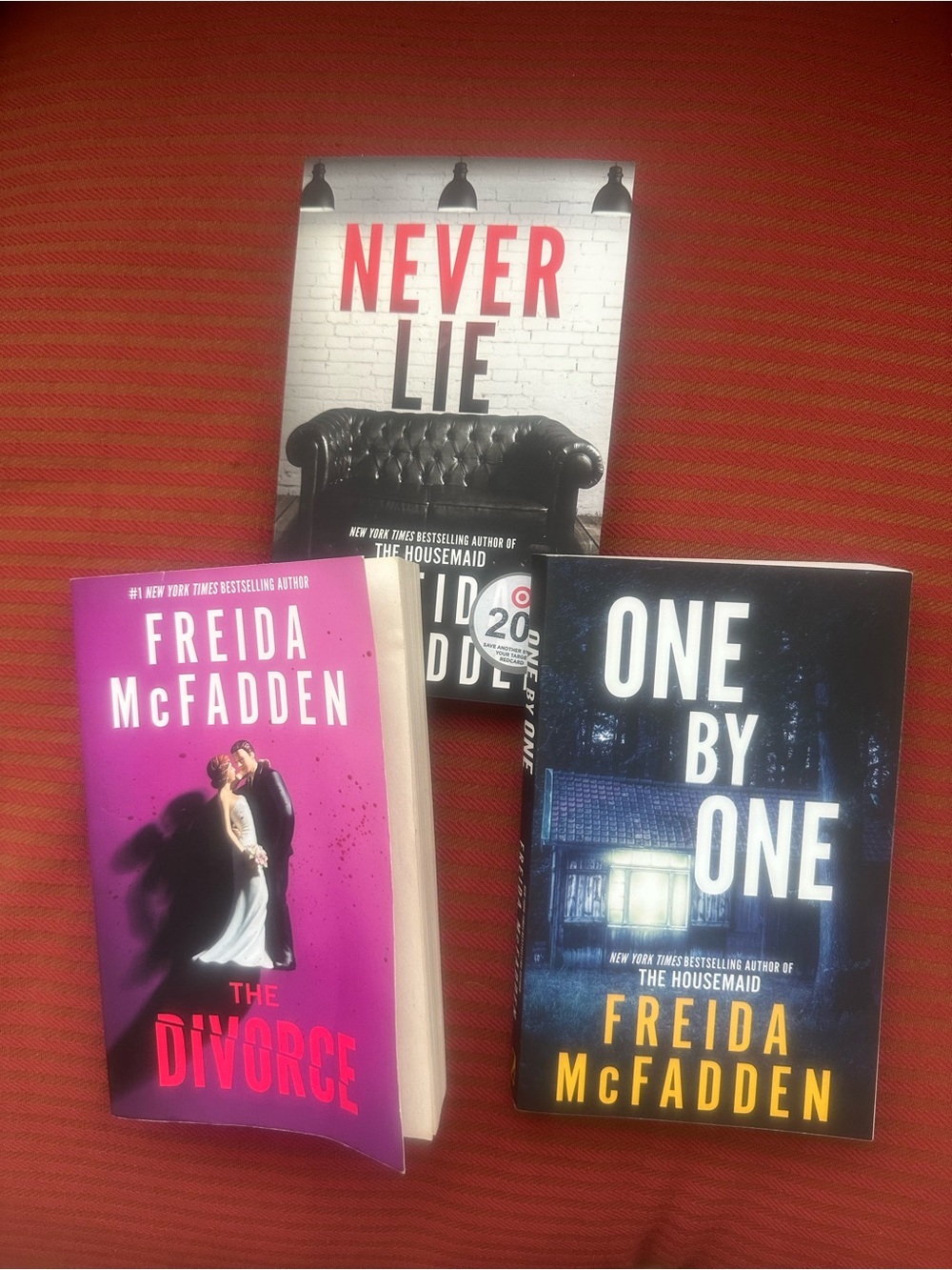 Lot of 3 Freida McFadden PBs. The Divorce, One by one, Never Lie. VG, Like new